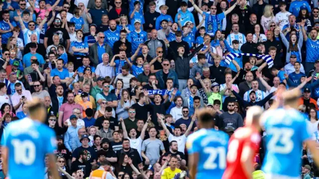 Stockport County fans celebrate during the League Two play-offs