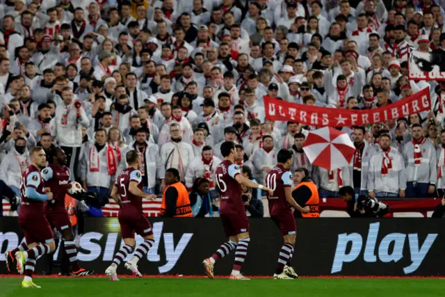 West Ham players celebrate with Paqueta after his opener.