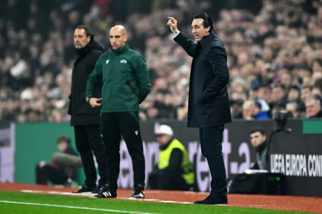 Emery directs his team from the touchline