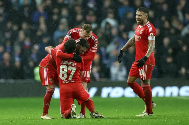 Rafa is mobbed by teammates after scoring ahuge goal for benfica