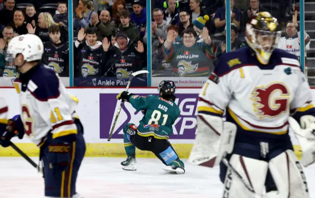 Kohei Sato celebrates after scoring against Guildford