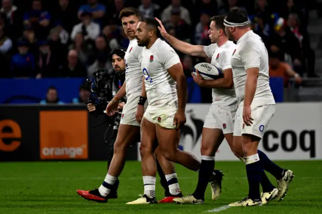 Teammates celebrating a Try