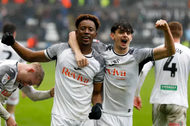 Jamal Lowe celebrates with Charlie Patino