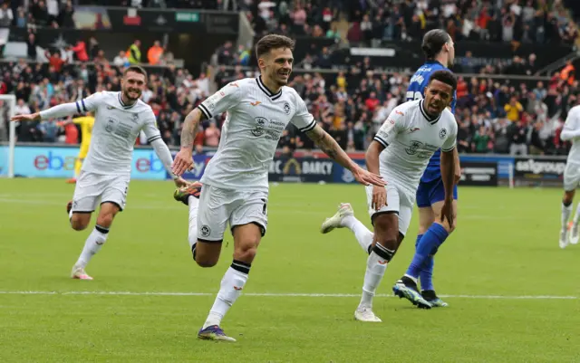 Jamie Paterson celebrates scoring against Cardiff