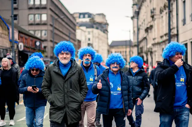 Italy fans in blue wigs