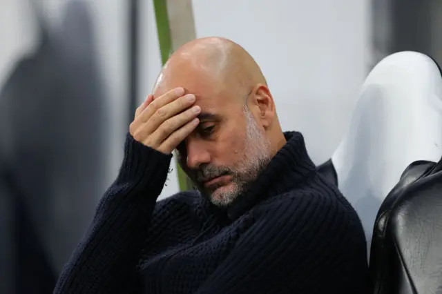 Pep Guardiola looks dejected