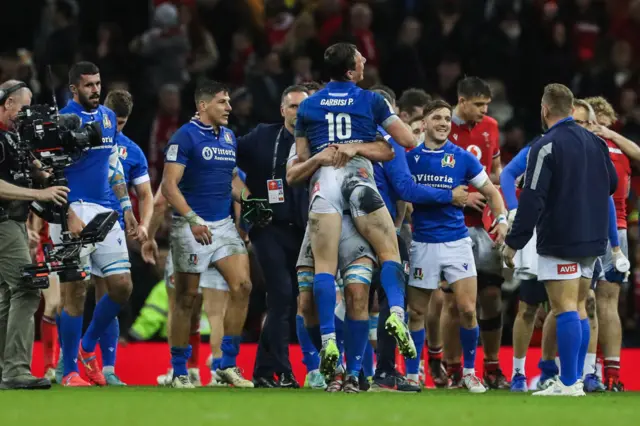 Italy players celebrate