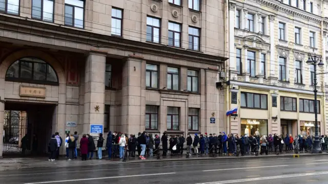 A long queue outside a polling station in Saint Petersburg.