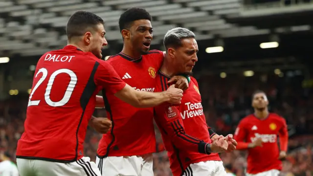 Manchester United celebrate scoring against Liverpool
