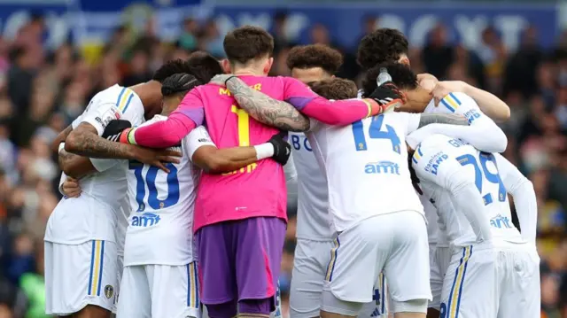 Leeds players in a huddle