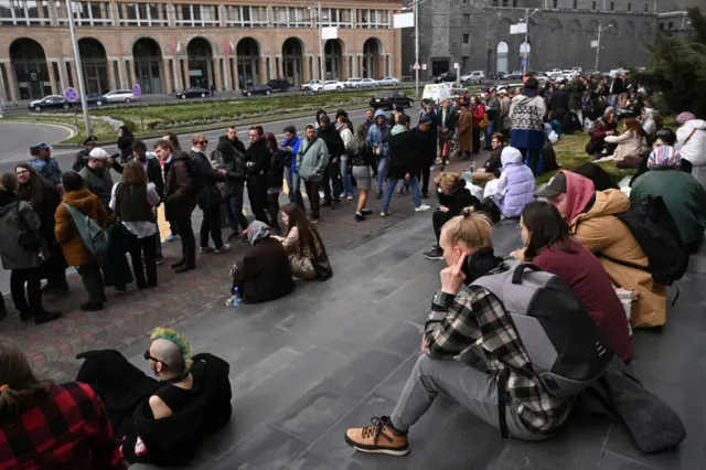 Voters queue outside the Russian embassy in Yerevan