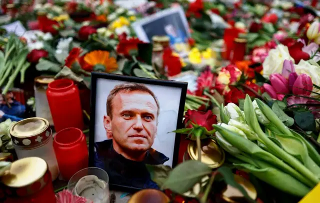 A picture of Alexei Navalny at a memorial