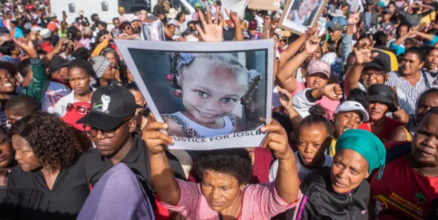 A huge crowd protest outside court during the Joslin Smith disappearance case at Vredenburg Magistrate's Court on March 07, 2024 in Vredenburg, South Africa.