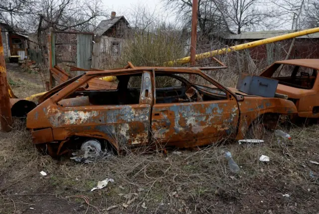 The remains of destroyed cars in the town of Avdiivka, eastern Ukraine