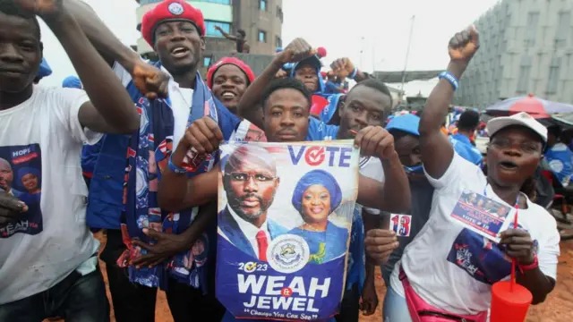 Supporters of the governing Coalition for Democratic Change (CDC) party of incumbent president George Weah jubilate during the campaign closing and pre-victory parade to mark the end of campaigns in the streets in Monrovia, Liberia, 08 October 2023