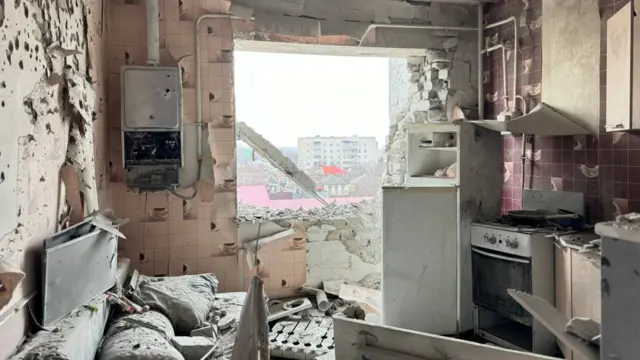 A view shows a destroyed kitchen in an apartment block hit by shelling, what local authorities called a Ukrainian military strike