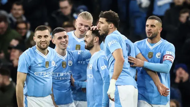 Manchester City players celebrate