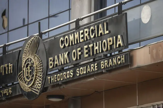 Signage above the entrance to a branch of the Commercial Bank of Ethiopia in Addis Ababa, Ethiopia, on Thursday, Dec. 7, 2023