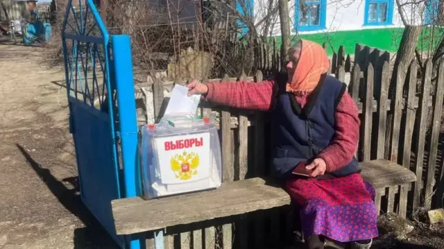 A woman votes in Kherson region