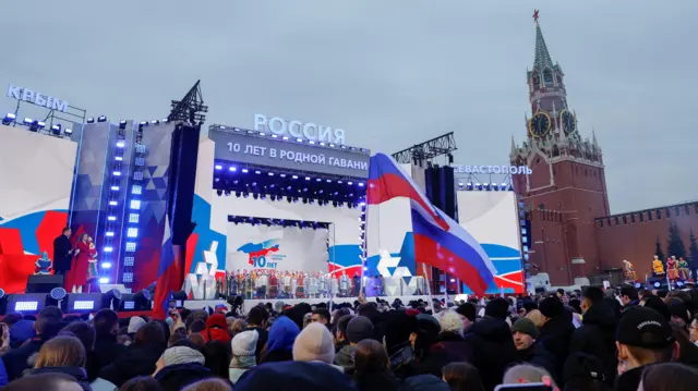 People attend a rally, which marks the 10th anniversary of Russia's annexation of Crimea from Ukraine, in Red Square in central Moscow, Russia, March 18, 2024