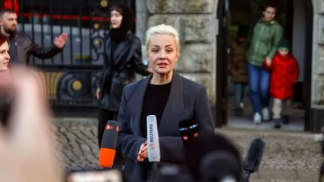 Yulia Navalny talking to the media outside the Russian embassy in Berlin, 17 March