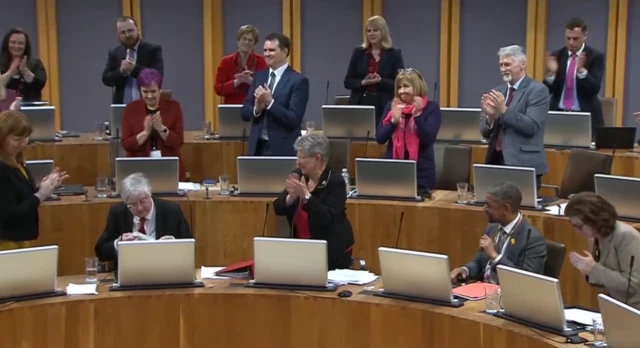 Mark Drakeford get a second standing ovation from Senedd members