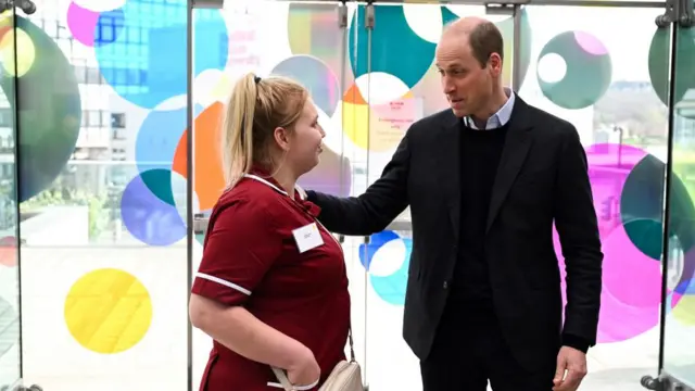 Britain's William, Prince of Wales speaks with Maisy Lee, a nurse attending the Homewards Sheffield Local Coalition meeting, at the Millennium Gallery in Sheffield, Britain, March 19, 2024