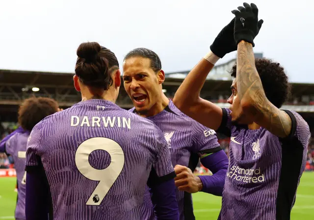 Van Dijk screams in delight at Nunez as Diaz claps the fans.