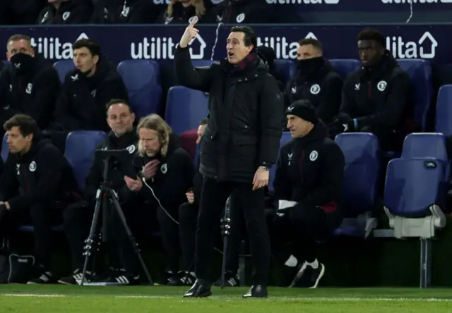 Emery gestures an instruction to his players.