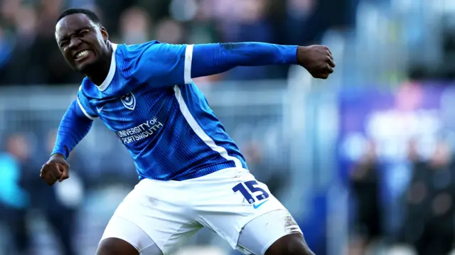 Christian Saydee celebrates scoring for Portsmouth