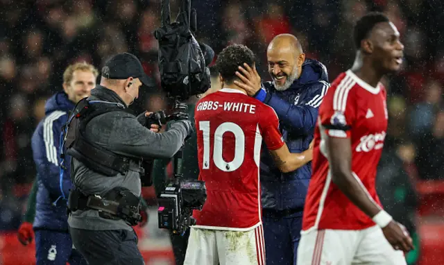 Nottingham Forest head coach Nuno Espírito Santo hugs Morgan Gibbs-White