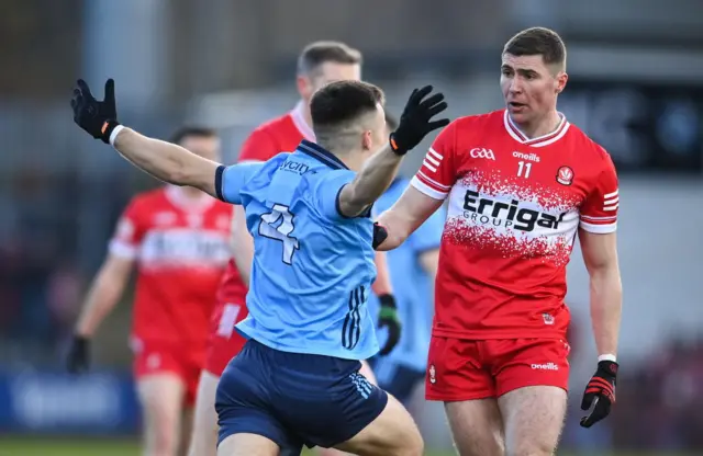 Dublin's Eoin Murchan confronts Ciaran McFaul of Derry in Saturday's game