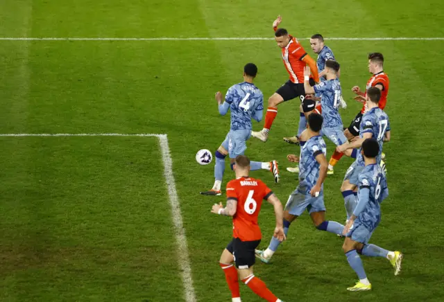 Morris volleys home to equalise for Luton.