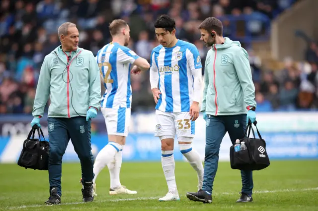 Huddersfield's Yuta Nakayama limps off