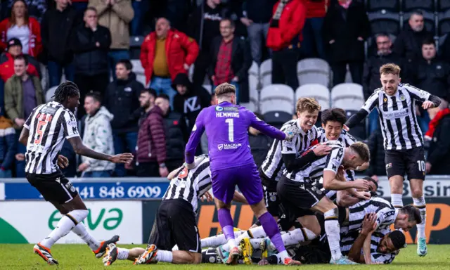 St Mirren players celebrate a remarkable victory in Paisley