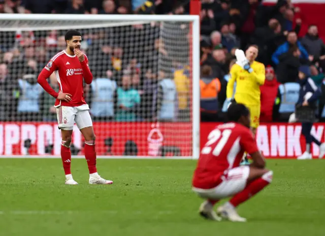 Forest players stand on their haunches after conceding a last gasp winner,