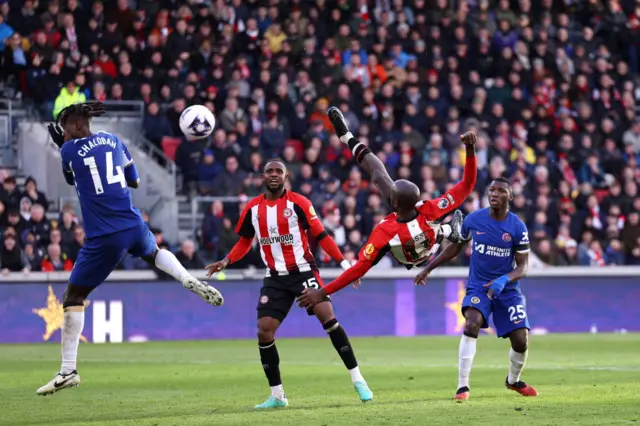 Wissa volleys home acrobatically for Brentford.