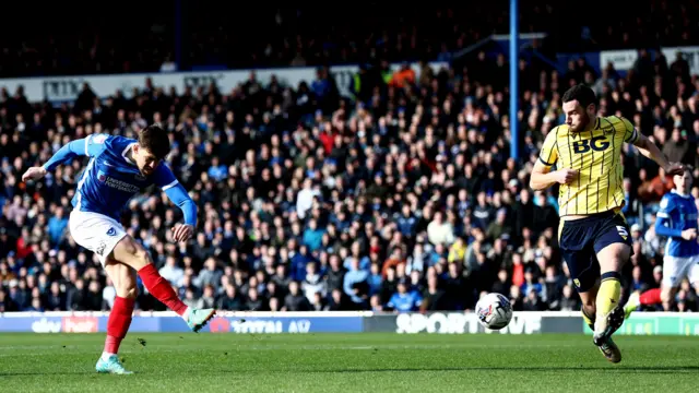 Callum Lang scores for Portsmouth against Oxford