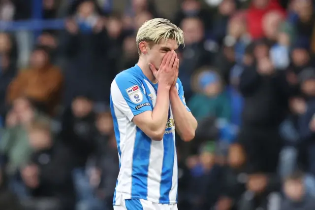 Huddersfield's Jack Rudoni reacts to an effort being saved