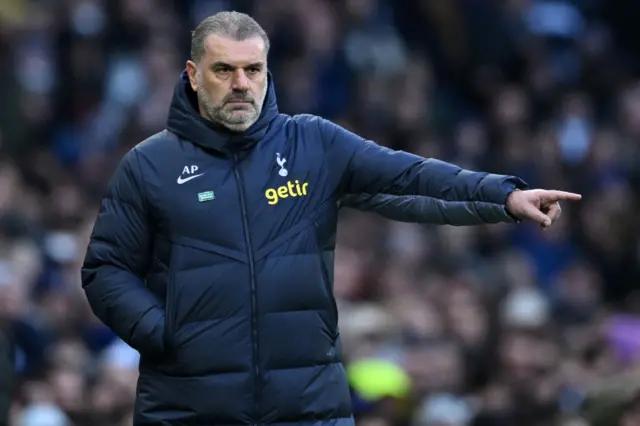 Postecoglou points instructions to his players.