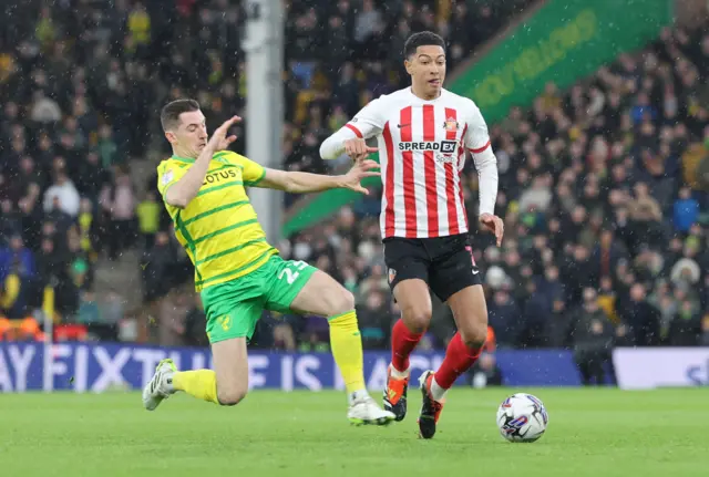 Sunderland's Jobe Bellingham is tackled by Kenny McLean