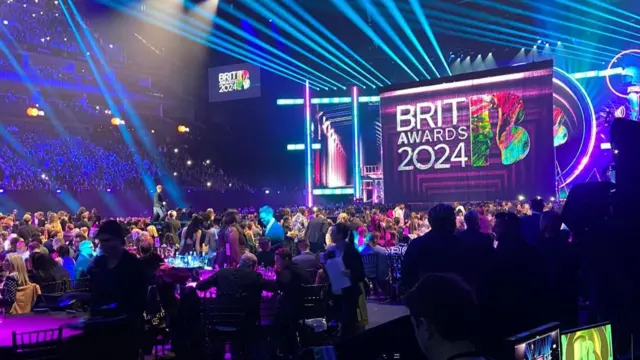 Inside Brit Awards from behind screens, with tables full of celebrities