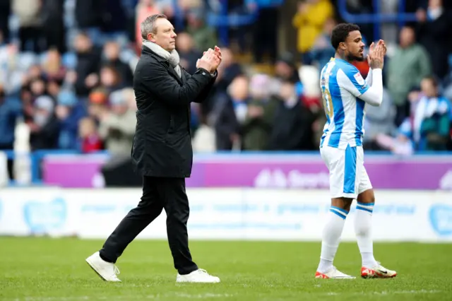 Huddersfield boss Andre Breitenreiter applauds the fans after his side's draw with Leeds