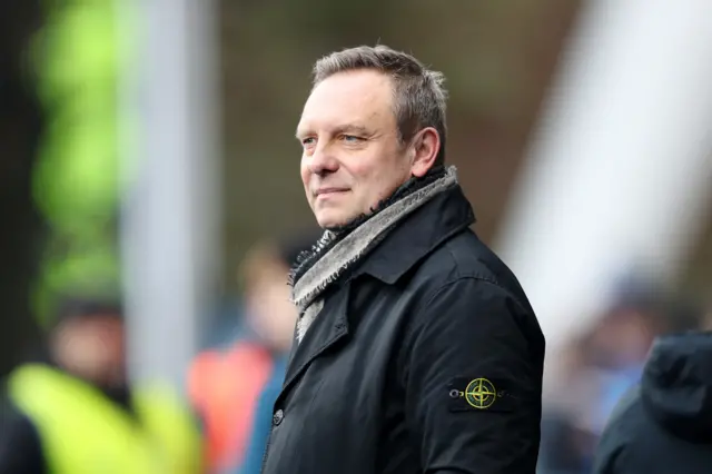 Huddersfield Town boss Andre Breitenreiter watches the game with Leeds