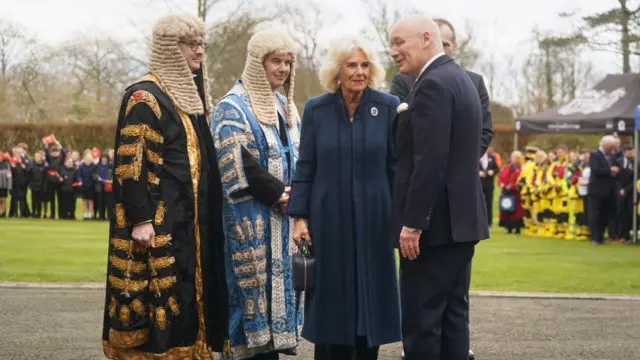 Queen Camilla is welcomed to Government House, in Onchan, Isle of Man, where she is meeting community groups, and representatives from the RNLI and the Manx Bluetits swimming club. Picture date: Wednesday March 20, 2024