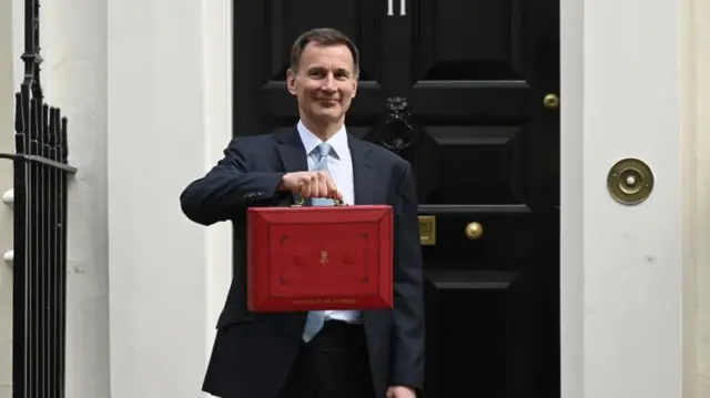 Chancellor of the Exchequer Jeremy Hunt outside 11 Downing Street on Budget Day 2024, 6 March 2024