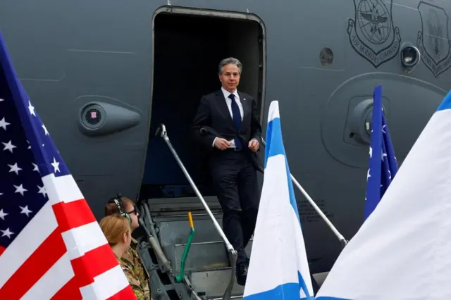 US Secretary of State Antony Blinken disembarks from an aircraft as he arrives in Israel