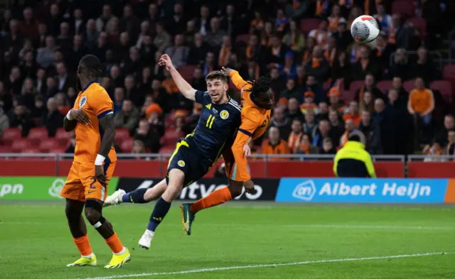 Scotland's Ryan Christie hits the bar with a header against the Netherlands