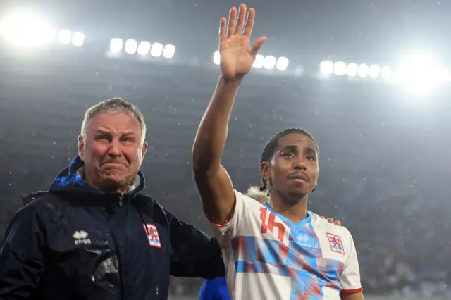 Luxembourg's midfielder Leandro Barreiro tearffully waves to fans