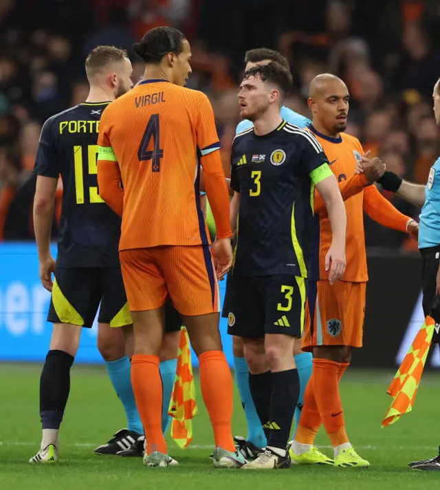 Scotland's Andy Robertson and Virgil Van Dijk during an international friendly match between the Netherlands and Scotland at the Johan Cruyff Arena